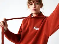Женский свитер lacoste