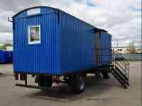 Передвижной вагон-дом для проживания на прицеп-шасси