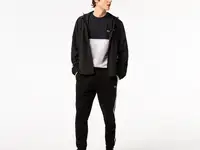 Мужские спортивные брюки lacoste в полоску