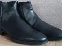 Продам новые зимние мужские кожаные сапоги