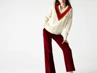 Женский шерстяной свитер lacoste в полоску