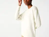 Шерстяной женский свитер lacoste