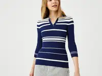 Женский свитер lacoste