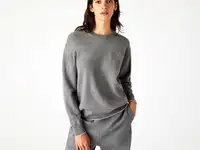 Шерстяной женский свитер lacoste с круглым вырезои