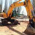 Услуги, аренда, заказ колесного экскаватора, фотография 3