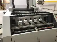 Линия для производства и упаковки офисной бумаги формата А4, фотография 3