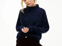 Женский свитер lacoste