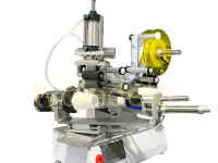 Этикетировщик для овальной тары