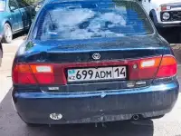 Продам Mazda 323, 1995г, 1,5, 118000км, фотография 2
