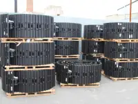 Гусеницы в сборе с башмаками траками для экскаватора.