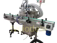 Автоматическая поршневая машина розлива без конвейера, фотография 2