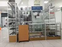 Продам 7 витрин с товаром ОПТИКА, фотография 4