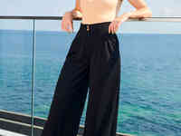 Свободные брюки с защипами