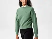 Женский свитер lacoste