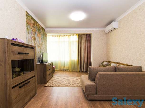 Комфортные апартаменты в центре города, Ул. Навои 9/1, фотография 12