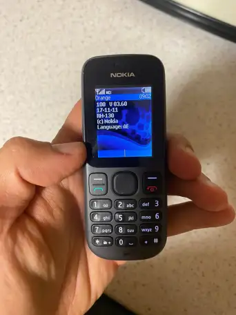 Мобильный телефон Nokia 100     новый в коробке зарядка, фотография 1