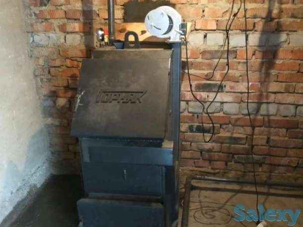 Установка котлов отопления длительного горения, фотография 2