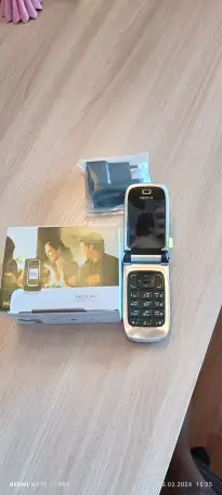 Продаётся сотовый телефон Нокиа 6131, раскладушка, раритет. Новый., фотография 2