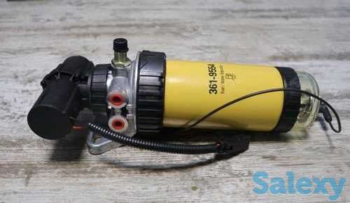 Топливный насос, подкачка (ТННД) на экскаватор-погрузчик Caterpillar 428 (C, D, E, F), 432 (C, D, E, F) Cat, Кат, фотография 1