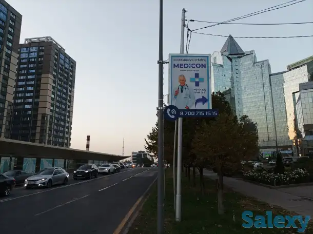 Рекламный указатель на придорожный столб, фотография 3