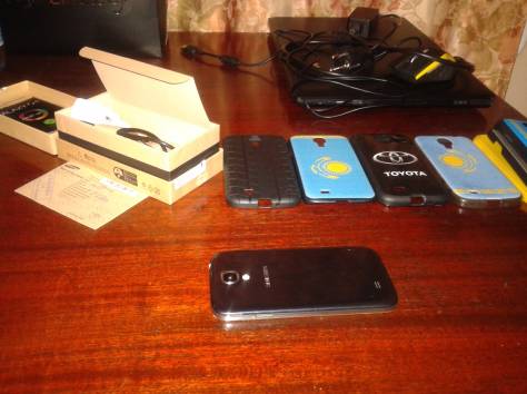 Samsung Galaxy S4 черного цвета, в отличном состоянии, фотография 1