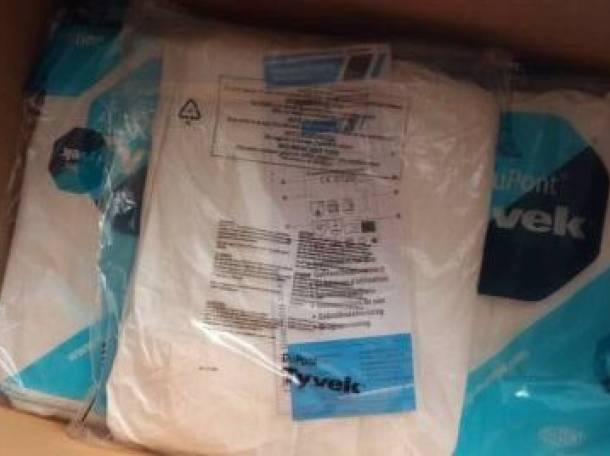 Однаразовые комбинезоны , фотография 2