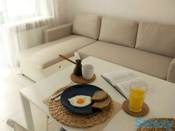 Уютные апартаменты по Аль-Фараби, улица Ходжанова 77, фотография 3