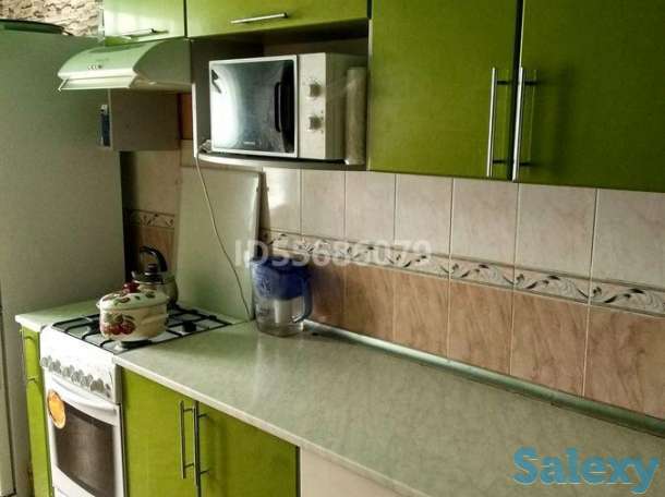 Продам 4-х комнатную квартиру улучшенной, 7 микрорайон, 9 дом, фотография 2