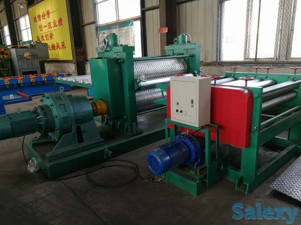 станок прижимает противоскользящий рисунок путем прокатки, фотография 3