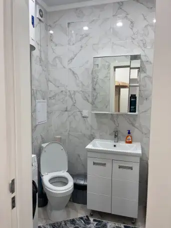 Уютная двухкомнатная  квартира студия в центре города, фотография 4