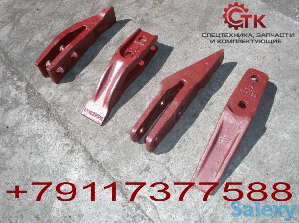 Зубья и бокорезы ковшей экскаваторов-погрузчиков, фотография 1