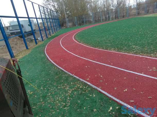 Устройство тартанового покрытия, фотография 2