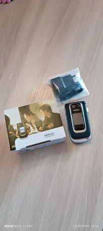 Продаётся сотовый телефон Нокиа 6131, раскладушка, раритет. Новый., фотография 1
