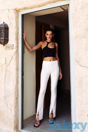 Молочные брюки с разрезами, фотография 1