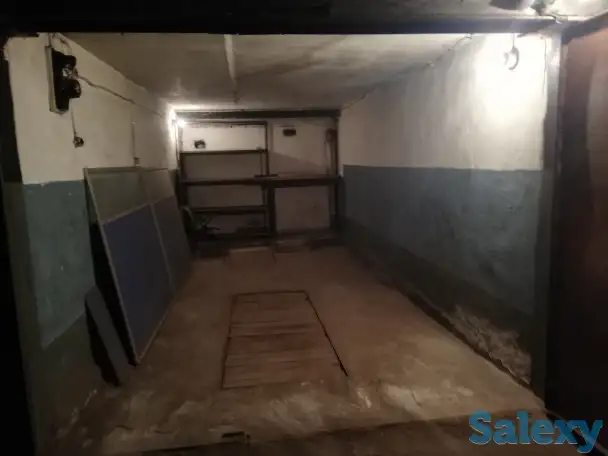 Подземный гараж со смотровой канавой в центре города, фотография 5