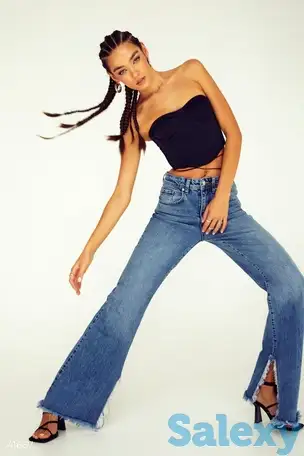 Расклешенные джинсы с бахромой, фотография 1