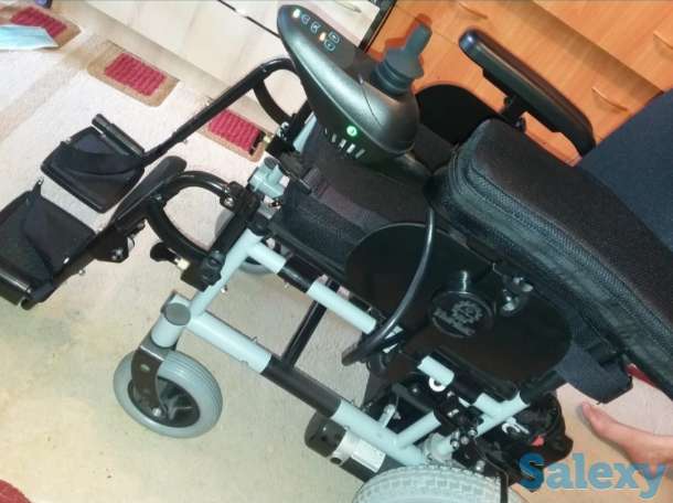 Инвалидная коляска, фотография 1
