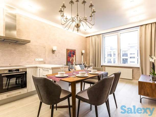 Комфортные апартаменты в центре города, Ул. Навои 9/1, фотография 2