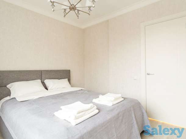 Комфортные апартаменты в центре города, Ул. Навои 9/1, фотография 7