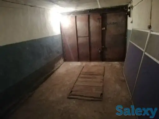 Подземный гараж со смотровой канавой в центре города, фотография 1