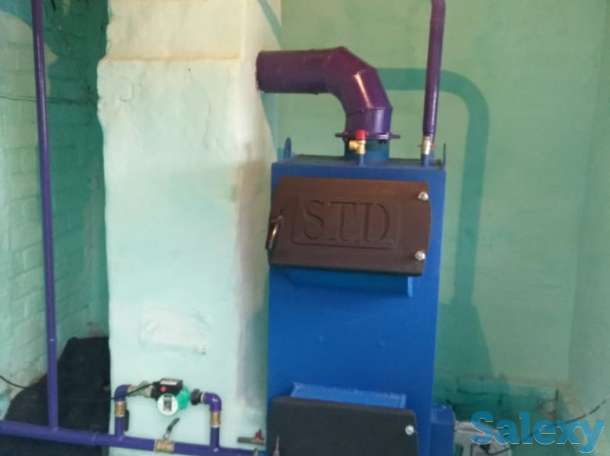 Установка котлов отопления длительного горения, фотография 1