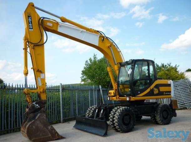 Услуги, аренда, заказ колесного экскаватора, фотография 2