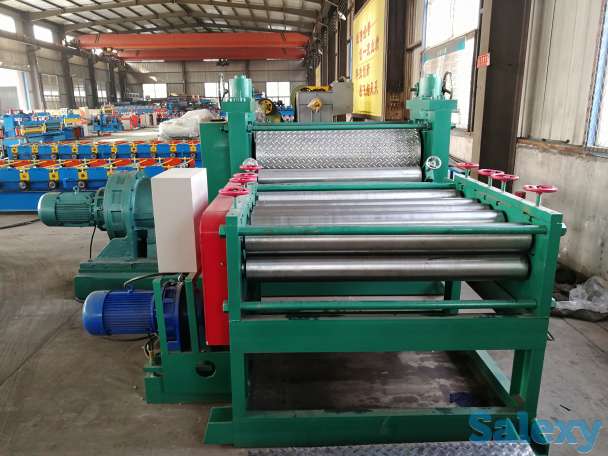 станок прижимает противоскользящий рисунок путем прокатки, фотография 1