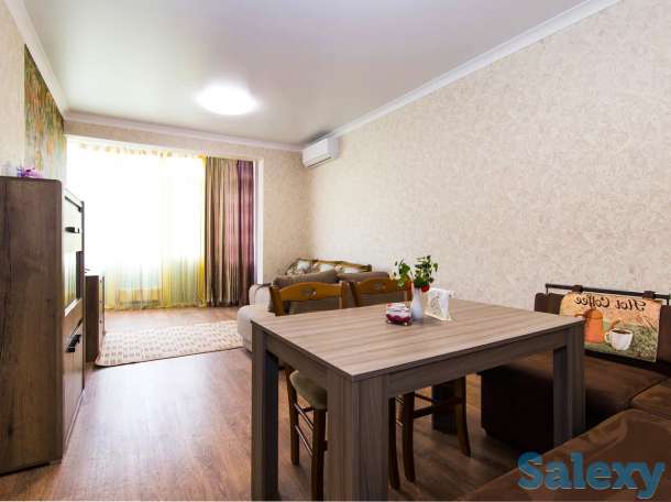 Комфортные апартаменты в центре города, Ул. Навои 9/1, фотография 15