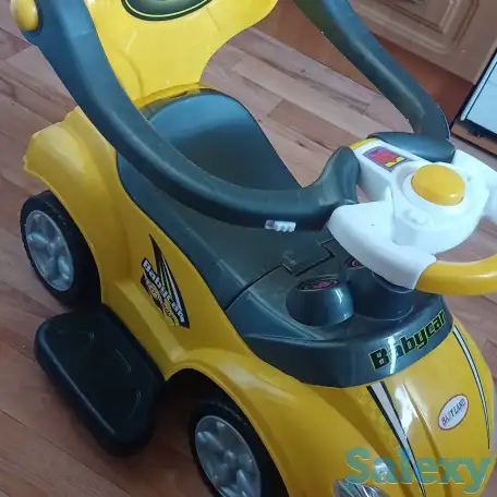 Продам детскую машинку с ручкой, фотография 4