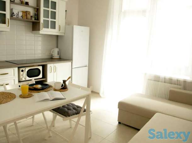 Уютные апартаменты по Аль-Фараби, улица Ходжанова 77, фотография 2