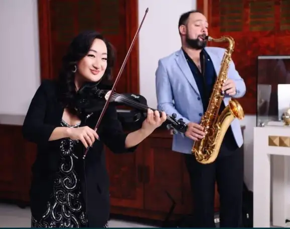 Саксофонист и скрипачка на мероприятия, фотография 1