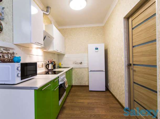 Комфортные апартаменты в центре города, Ул. Навои 9/1, фотография 1