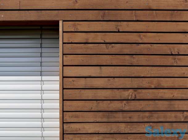 Облицовка фасада сайдингом под дерево (планкен), фотография 1