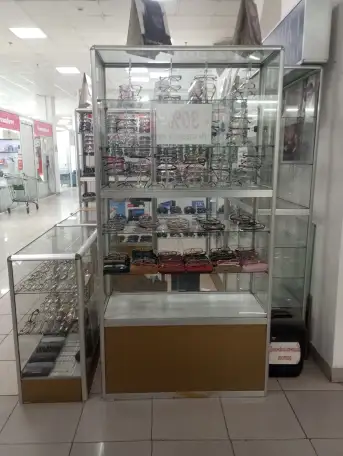 Продам 7 витрин с товаром ОПТИКА, фотография 1